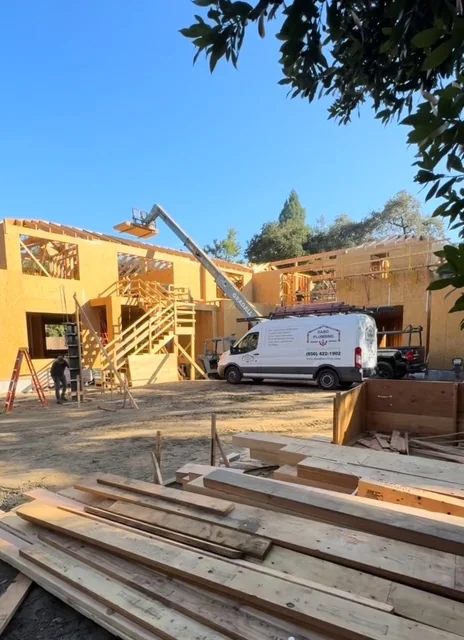Daso Plumbing fleet vehicle on site at a custom estate construction build in Woodside, CA